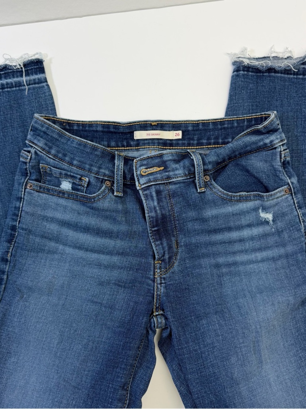 Levi's Women's Skinny Jeans in Medium Blue with Frayed Hem